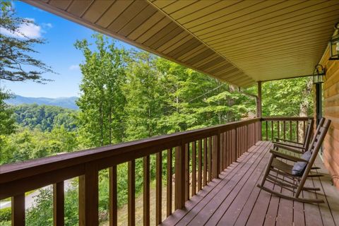Upstairs balcony with rocking chairs and the long view