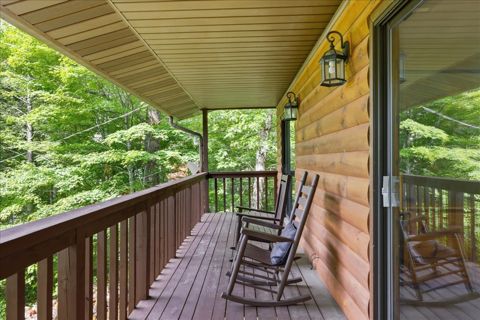 Covered porch with rocking chairs