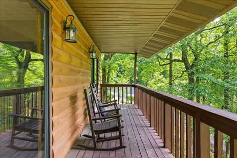 Covered porch with rocking chairs