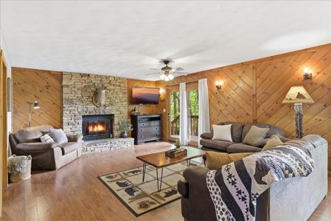 Living room with the fireplace lit