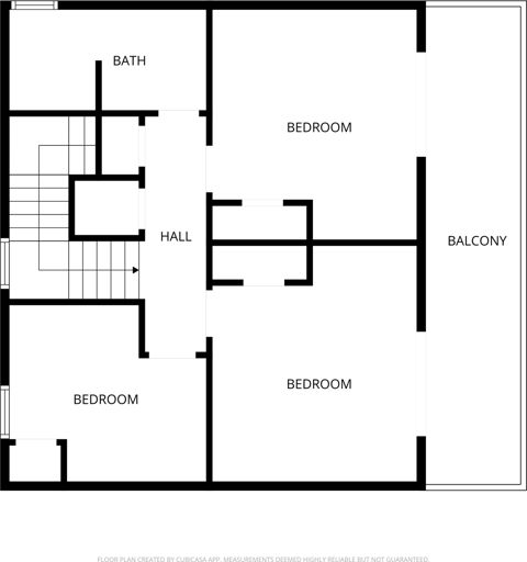 Upper level: three bedrooms, a bathroom and the balcony
