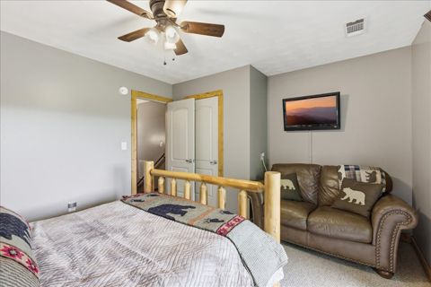 Queen room loveseat and TV