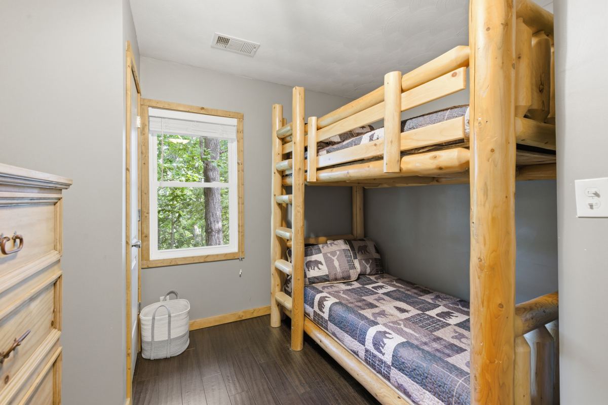 Bunk room with log bunk beds